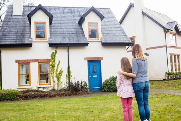 mother-daughter-standing-lawn (1)